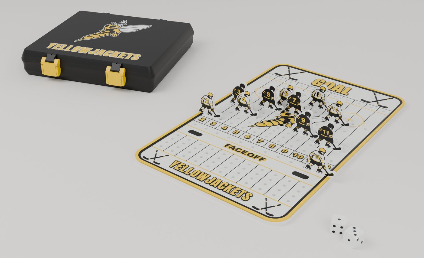 Yellowjackets hockey dice game: numbered gold, black and white player pieces on the rink board, two dice, and the black storage box with gold latches and the Yellowjackets logo
